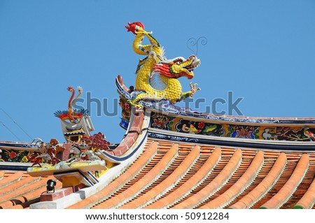 Dragon Design On The roof Of A Chinese Temple