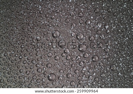Wet marble surface with water buble