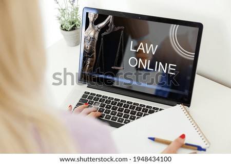 Woman video conferencing with lawyer on laptop. Video call and online service concept.
