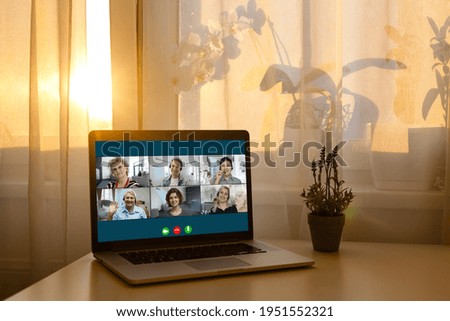 Virtual meeting online. Video conference by laptop. Online business meeting. On the laptop screen, people who gathered in a video conference to work on-line