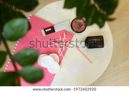 Set of professional cosmetic: make-up brushes, lipstick and brow pencil