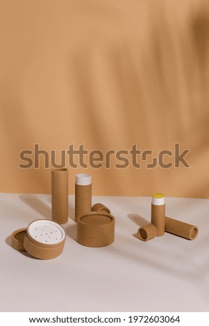 Recyclable paper tube with paper cap, cardboard container for packaging isolated on white background with copyspace, mockup. Recyclable packaging and zero waste concept