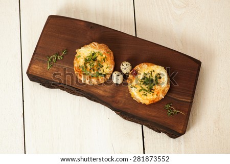 Mini Breakfast egg meal on a unique handmade serving tray.