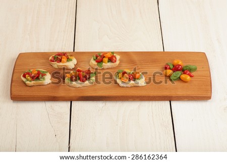 Bruschetta being served on an unique tray