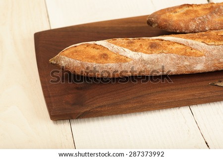 Loaf of french bread on a cutting board