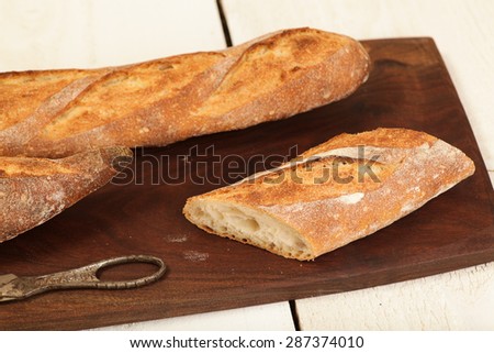 Loaf of french bread on a cutting board