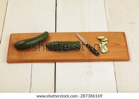 Cucumber on a wood cutting board