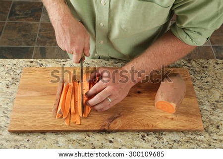 Sweet potato on a wood cutting board
