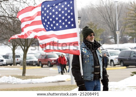 Madison, WI-February 17:Members of the Patriot Guard Riders motorcycle club demonstrate before the 32nd IBCT sendoff ceremony on Feb 17, 2009. Madison, WI.