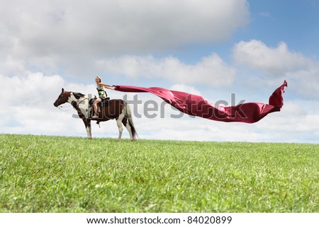 Horse rider with flying textile