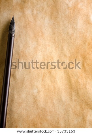 China calligraphy brush on the blank sheet of paper