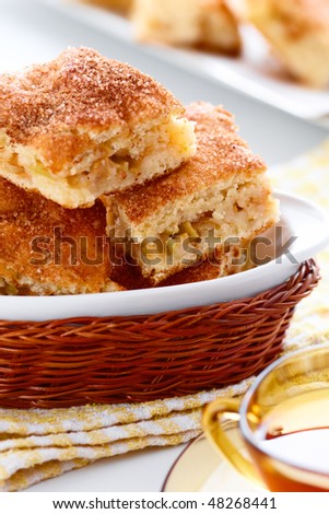 Homemade apple sponge cakes in the white bowl,shallow focus