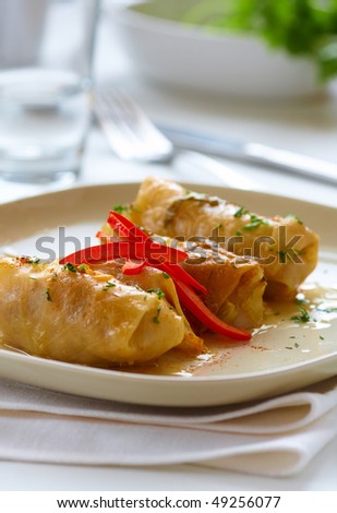 Stuffed cabbage rolls with red pepper and herbs