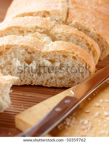Sliced ciabatta bread on the bamboo napkin,closeup