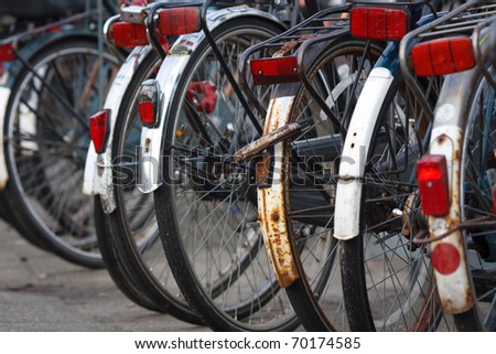 Parking of old bicycles in Amsterdam,closeup,shallow focus