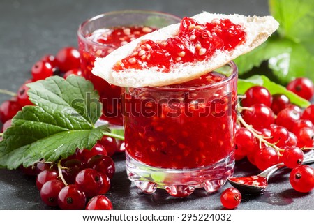 Red currant jam and bread, selective focus