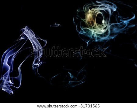 Colored blue yellow green smoke slowly flow isolated in studio