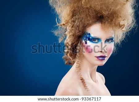 Winter Queen portrait of beauty woman with creative winter makeup