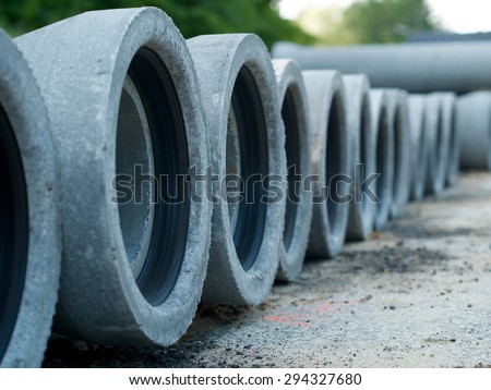 concret pipe stacked sewage water system in a row