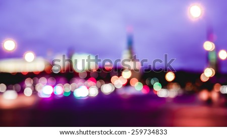 De-focus night city with Moscow Kremlin in purple tones