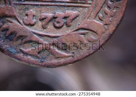 old copper coin, detail