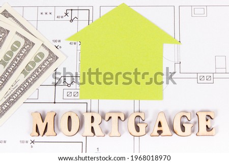 Money on electrical diagrams, concept of mortgage loan for buying house