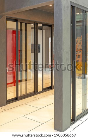 Aluminium Black Sliding Doors in Home Corridor