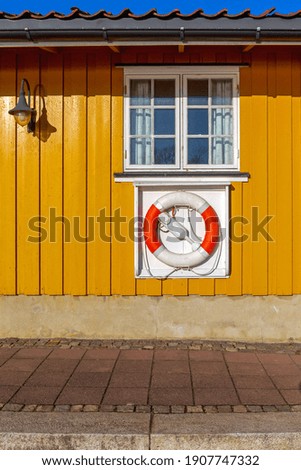 Lifebuoy Ring Safety Device at Wooden Cabin Wall