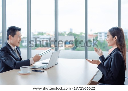 Recruiter interview young asian woman job candidate asking questions for a job interview.