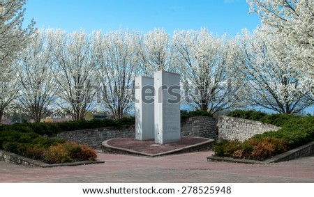 911 Memorial Overpeck Park, Leonia NJ. Springtime memorial for 9/11. Never forget, memorial. New York City, New Jersey monument. Park setting with cherry blossoms. Springtime in the outdoors.