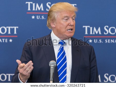Donald Trump speaks to the press before his Town Hall forum with Senator Tim Scott at the Koger Center for the Arts in Columbia S.C. on September 23, 2015