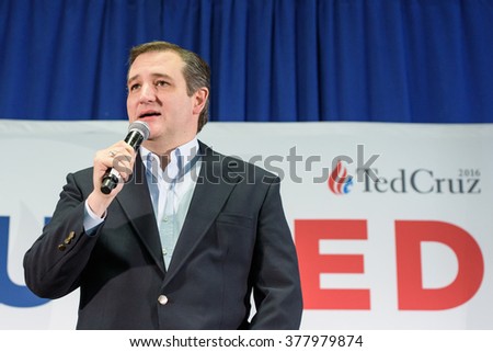 Columbia, South Carolina - February 17, 2016: Presidential candidate Ted Cruz(R) speaks to a crowd of supporters at The Columbia Armory in South Carolina.