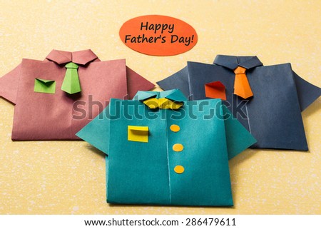 Elements of design for Father\'s day: a shirt made from paper in origami technique, the inscription: Happy Father\'s Day