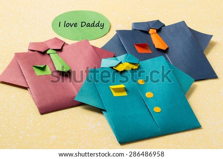 The idea of design for Father\'s day: shirts from paper technique origami and the words: I love daddy