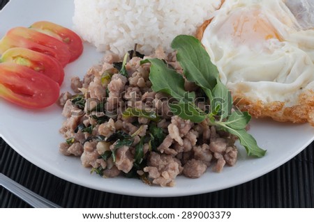 Thai spicy food, Spicy fried pork with basil and fried egg