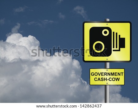 Comical government road speed camera sign against a cloudy blue sky