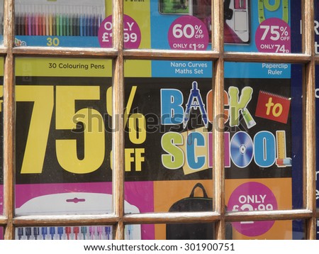 Winchester High Street Hampshire, England â?? July 31, 2015 â?? W H Smith shop window poster advertising reductions on back to school stationary