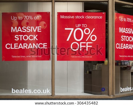 Winchester, High Street, Hampshire, England - August 15, 2015: Beales department store advertising new lines and sale, company established in 1881 founded by John Elmes