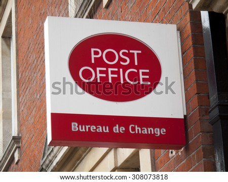Andover, Bridge Street, Hampshire, England - August 20, 2015: Post Office and Bureau de Change sign over post office premises,
