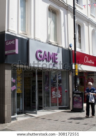 Newbury, Northbrook Street, Berkshire, England - August 07, 2015: Game store founded by Bev Ripley and Terry Norris as Rhino Group in 1991
