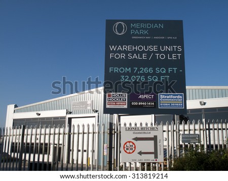 Andover, Greenwich Way, Meridian Park, Hampshire, England - September 6, 2015: Commercial warehouse units for sale or to let advertising sign