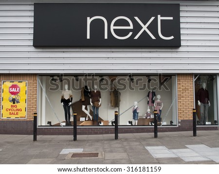 Andover, Retail Park, Hampshire, England - September 13, 2015: Next women and men fashion clothing store, company founded by Joseph Hepworth in Leeds in 1864