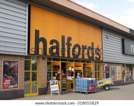 Andover, Retail Park, Hampshire, England - September 18, 2015: Halfords Group plc store, UK retailer of car parts, car enhancement, camping, touring and bicycles, founded in 1892