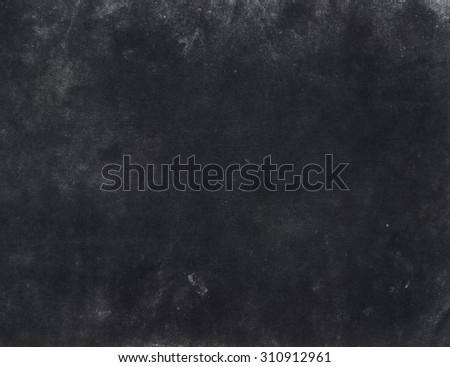 Black background. Grunge wall. Old black wall. Black background with spotlight. Grungy black texture background for multiple use