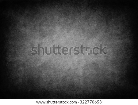 Black background. Dark grunge textured wall closeup. Grunge black vignette border frame on white gray background. Grungy black texture background for multiple use