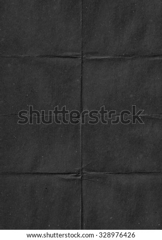 Black crumpled paper. Black abstract background