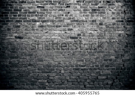 Old brick wall background. Grunge texture. Black background