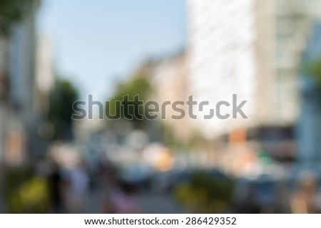 Blurred background photo.Cityscape bokeh. Defocused abstract city.Background out of focus.Can use as wallpaper, design. Summer blurry city backdrop.Travel out of focus photos. Fairy defocused photos.