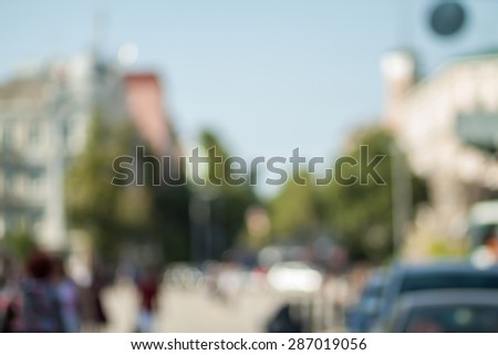 Blurred background photo.Cityscape bokeh. Defocused abstract city.Background out of focus.Can use as wallpaper, design. Summer blurry city backdrop.Travel out of focus photos. Fairy defocused photos.