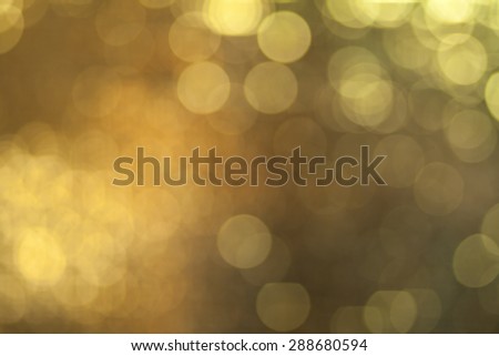Vintage bokeh background. Gold retro bokeh. Fairy defocused backdrop. Hipster photo wallpaper. Chicago style. Party invitation template. Celebration wallpaper. Blurry lights.